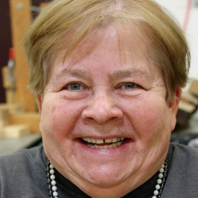 advocacy for people with disabilities rise mn lady in pearls smiling
