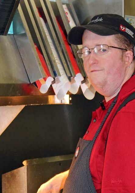 fostering a better life for individuals with disabilities guy in apron