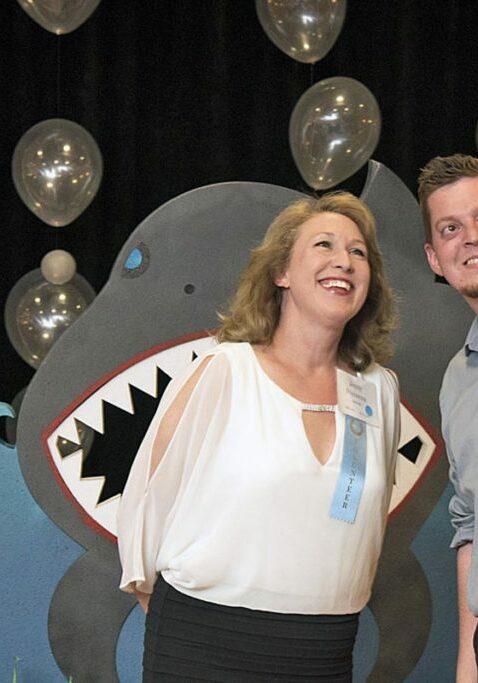 volunteer opportunities team members taking a selfie near balloons