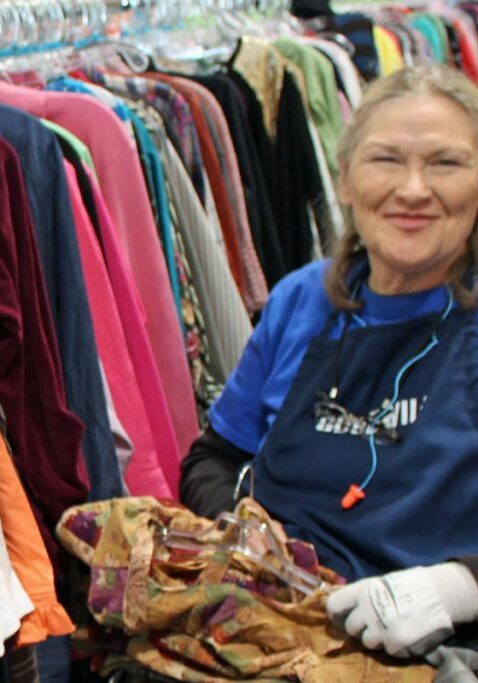 mn employment center lady restocking clothes at store