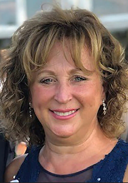 Headshot of Lynda Meland smiling.