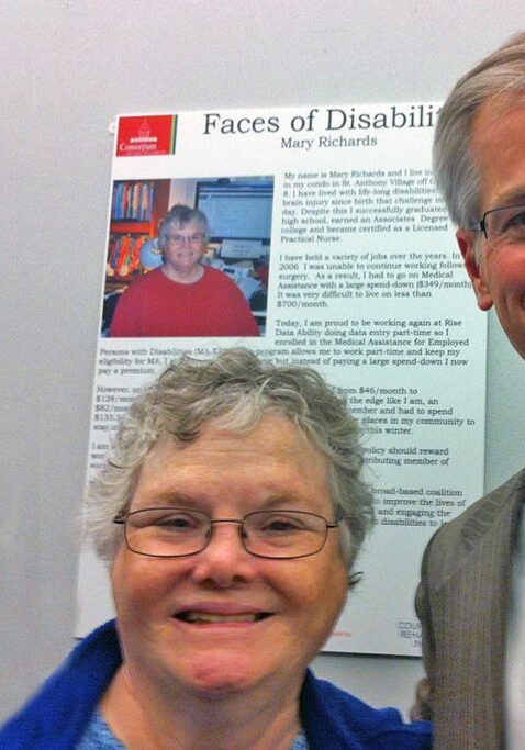 adults with disabilities mn team members standing in front of sign