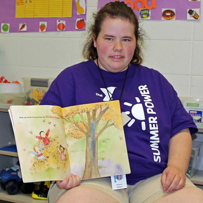 cbte job placement services twin cities woman reading book to class