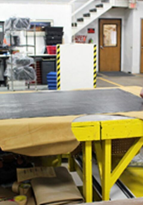 employment center team members working in wood shop