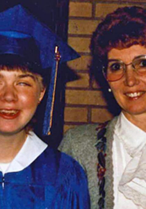 mental health and housing graduation pic with family