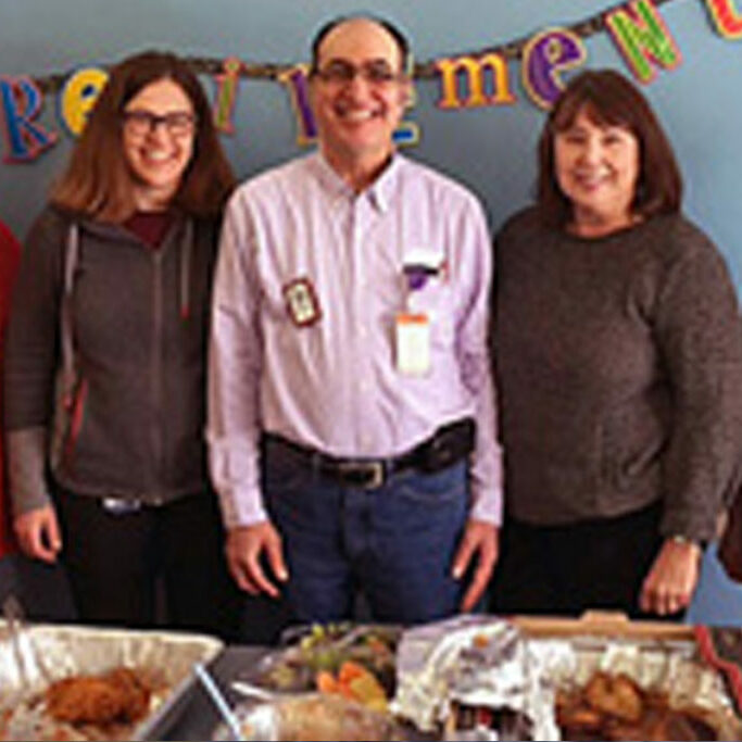 adult day mn group of people by food